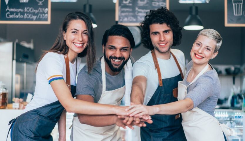 small business employees smiling for camera