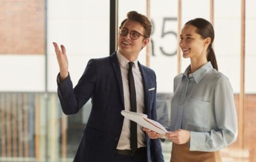 Real estate lawyer showing commercial property to a client.