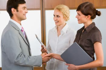 Professionals meeting to discuss business documents